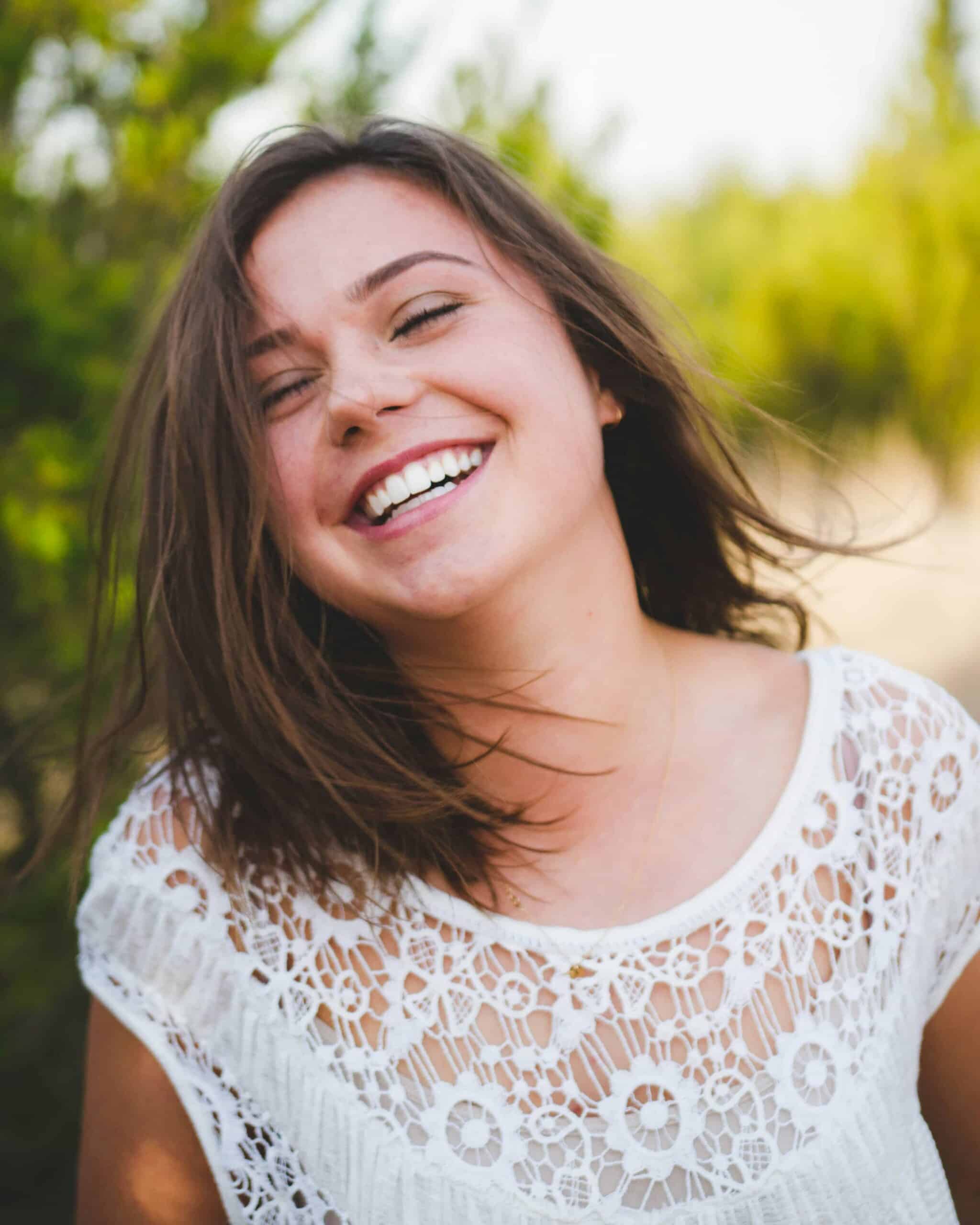 Stop the Bleeding: How to Get Rid of Gum Disease Fast 5 girl with canksore smiling outside