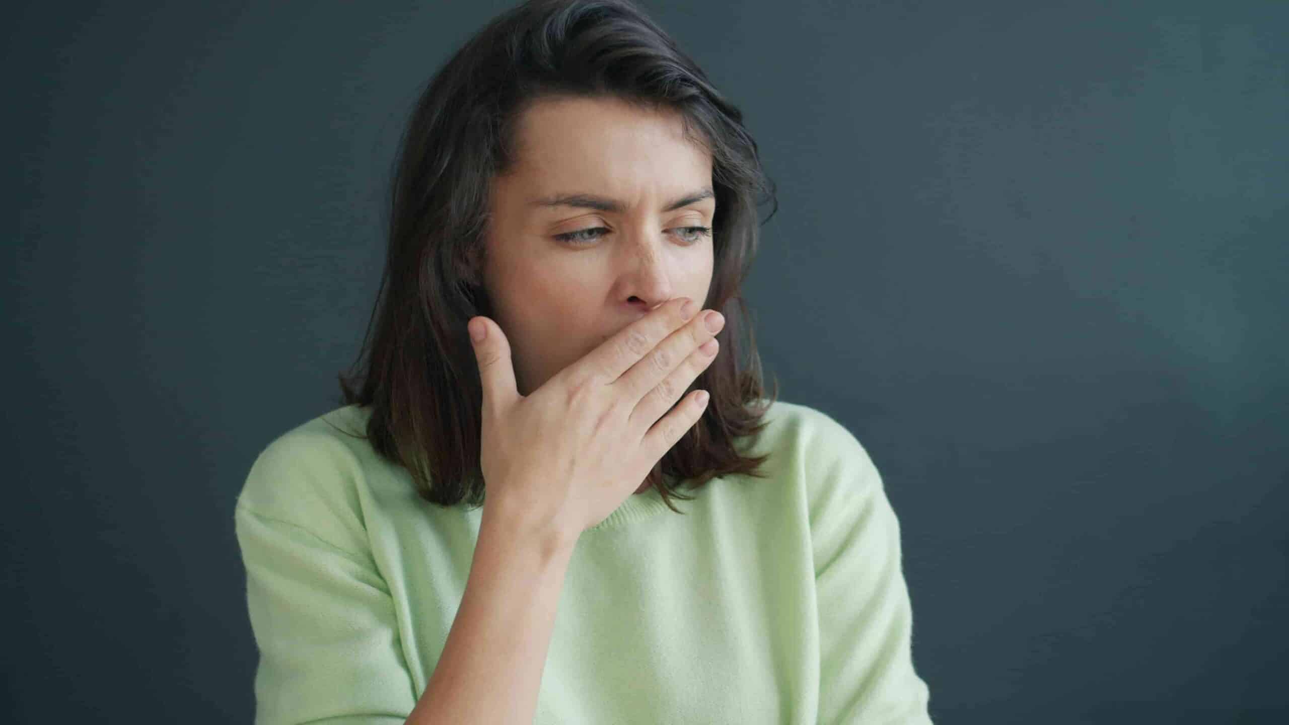 11 Ways to Make Your Breath Smell Better: All the Time 4 woman with bad breath yawning