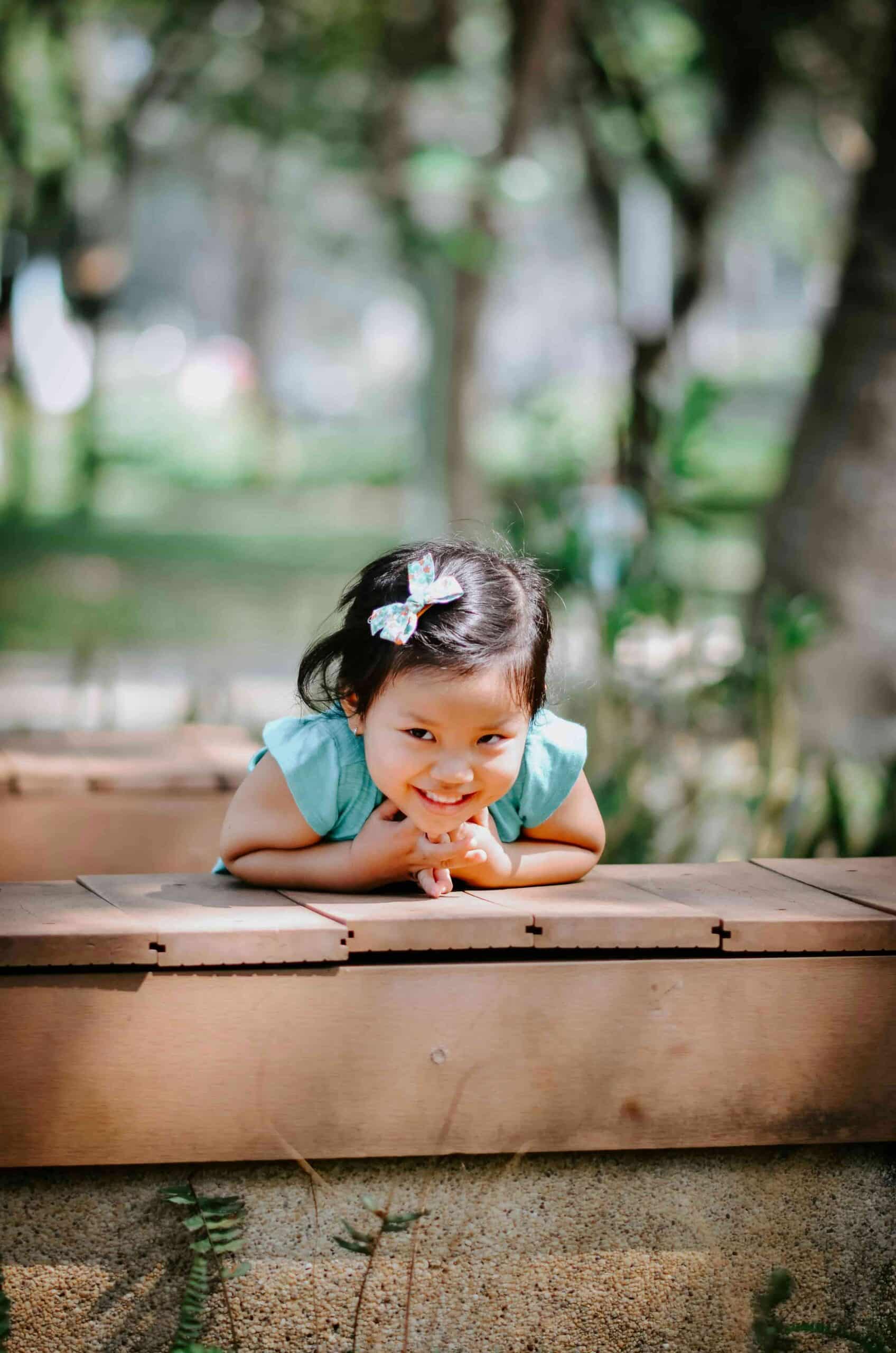 Best Hawthorne Parks for a Post-Dentist Treat 5 little girl playing in park